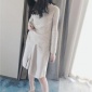 时尚潮品不规则裙摆女士羊毛衫套装圆领套头针织衫毛衣两件套厂家